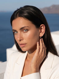 Boucles d'oreilles créoles torsadées Boucle Dualité portées, argent 925 plaqué or 18 carats – Soreli Paris