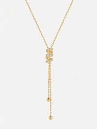 Collier Envoûtante – collier en Y plaqué or 18k, pendentif spirale pavé de zirconiums