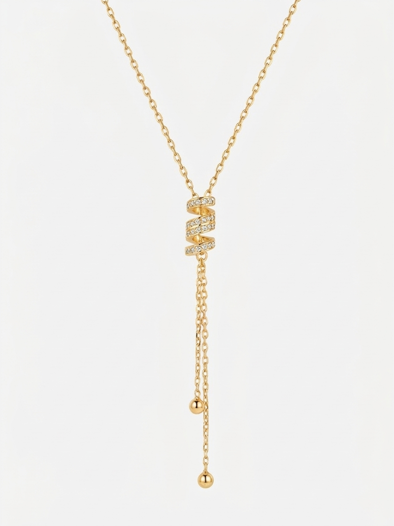 Collier Envoûtante – collier en Y plaqué or 18k, pendentif spirale pavé de zirconiums
